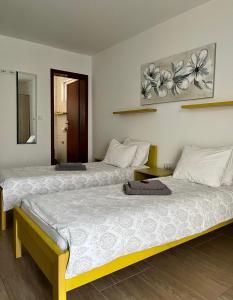 Villa Ponte tesisinde bir odada yatak veya yataklar