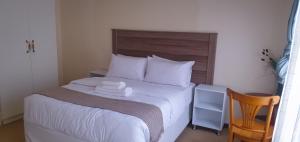 Voodi või voodid majutusasutuse Sweet Home@162 Guest House Summerstrand toas