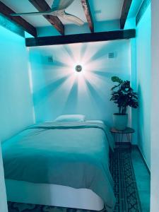 Łóżko lub łóżka w pokoju w obiekcie Casita del Flamingo en Casco Histórico