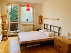 Posteľ alebo postele v izbe v ubytovaní Family apartman