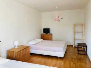 Posteľ alebo postele v izbe v ubytovaní Family apartman