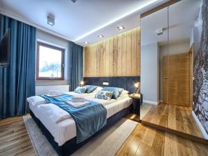 Llit o llits en una habitació de VisitZakopane - My Deer Apartment