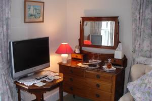 A television and/or entertainment center at Shrublands Farm 