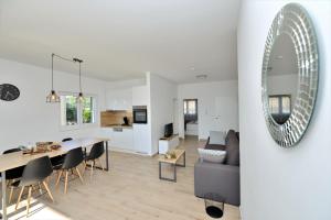 Posedenie v ubytovaní Villa Tećo - Moderne Apartments mit Pool und Meerblick