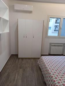 Ένα ή περισσότερα κρεβάτια σε δωμάτιο στο Magnifique appartement avec terrasse et piscine +15 φωτογραφίες