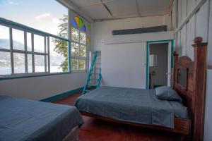 Postel nebo postele na pokoji v ubytování Hotel y Rest. las Cristalinas