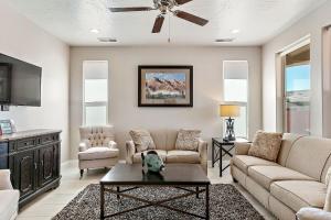 a living room with two couches and a tv at Great Escape home in Washington