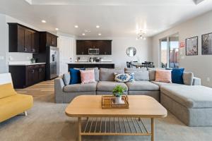 a living room with a couch and a table at Sienna Sunrise home in Washington