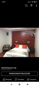 Cartel de un dormitorio con cama en una habitación en Hotel Residencial Miraflores, en Loja