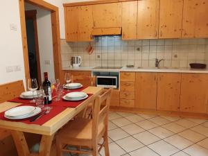 Kuchyňa alebo kuchynka v ubytovaní Chalet Beatrice