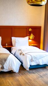 Postel nebo postele na pokoji v ubytování Riad villa saphir & SPA