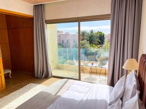 Postel nebo postele na pokoji v ubytování Riad villa saphir & SPA + 37 fotografií