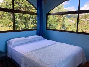 Postelja oz. postelje v sobi nastanitve El Paraiso Azul