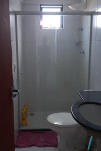 Ett badrum på Apto Jatiuca