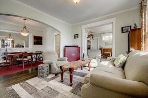 a living room with a couch and a table at 3 - 4 Bdrm Victorian Beach House in Asbury Park