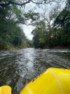 a view from the front of a boat on a river at Loft Stronger Spot in Bagaces