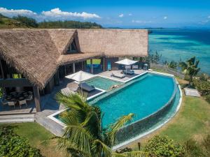 an aerial view of a resort with a swimming pool at Villa Malolo Levu in Malolo