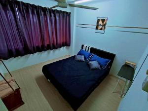 Voodi või voodid majutusasutuse Jo-Rumah 3 Bedroom Apartment Jelutong Georgetown Penang Free WIFI toas