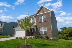 a house with a tree in the yard at 1392 Soaring Way Brand new construction in well-kept HOA community in Maineville