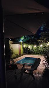 Bazén v ubytování Monoambiente en casa familiar nebo v jeho okolí