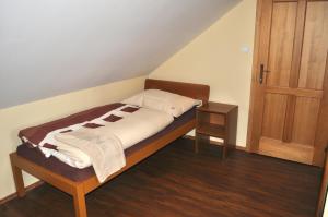 Posteľ alebo postele v izbe v ubytovaní Hotel Na Velké hospodě