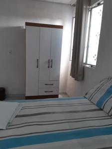 Postel nebo postele na pokoji v ubytování Pousada do joaquimxdarc