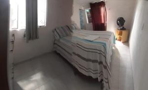 Postel nebo postele na pokoji v ubytování Pousada do joaquimxdarc