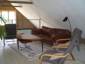 Area soggiorno di Ljugarn Holiday Home