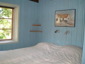 Letto o letti in una camera di Ljugarn Holiday Home