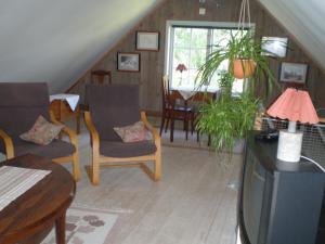 Area soggiorno di Ljugarn Holiday Home