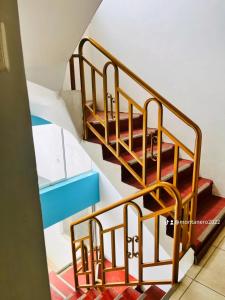 a set of stairs in a building at Montañero Hostel in Huaraz