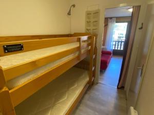 Łóżko lub łóżka w pokoju w obiekcie Bel appartement à Châtel près du centre et des télécabines, avec Multi Pass été à 3€/jour/personne - FR-1-693-63