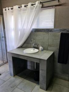 Vannituba majutusasutuses Bradbury Game Lodge and Function Venue