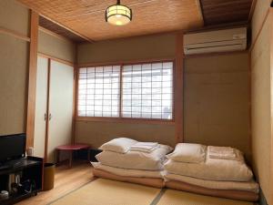 なごみ旅館 悠にあるベッド