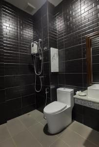 Koupelna v ubytování โรงแรมชลาลัย กระบี่ Chalalai Hotel Krabi