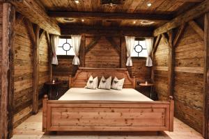 Postel nebo postele na pokoji v ubytování Hotel Gasthof Perauer