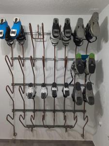 un montón de equipos eléctricos colgando de una pared en Appartement Spiss, en Ried im Oberinntal