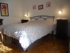A bed or beds in a room at Albergo Generale Cantore - Monte Amiata