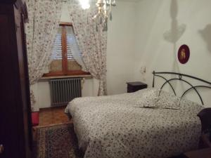 A bed or beds in a room at Albergo Generale Cantore - Monte Amiata