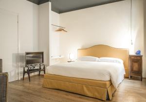 Lova arba lovos apgyvendinimo įstaigoje Brera Apartments in Porta Romana