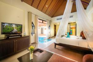 Postel nebo postele na pokoji v ubytování Chada Lanta Beach Resort - SHA Extra Plus