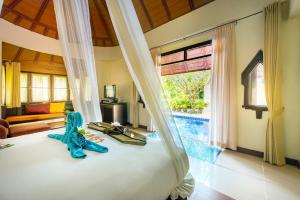 Postel nebo postele na pokoji v ubytování Chada Lanta Beach Resort - SHA Extra Plus