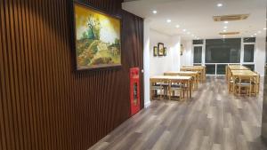מסעדה או מקום אחר לאכול בו ב-The Queen Hotel Ninh Binh