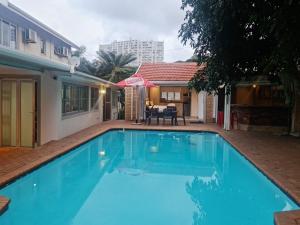 The swimming pool at or close to Africatamna Self Catering House