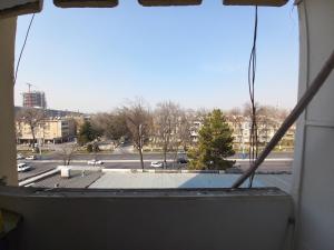 a window with a view of a city street at Apartment Center 1 in Tashkent