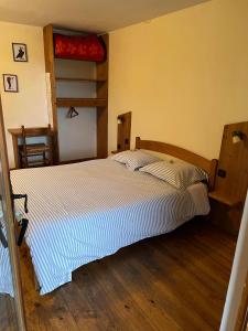 Letto o letti in una camera di Gîte les 3 cols