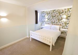 Postel nebo postele na pokoji v ubytování Garden Apartment Winchester