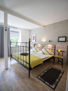 Postel nebo postele na pokoji v ubytování Ferienhaus Laux + 35 fotografií