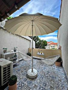 Balkón alebo terasa v ubytovaní Appartement Vintage 90 m2 DUPLEX classé