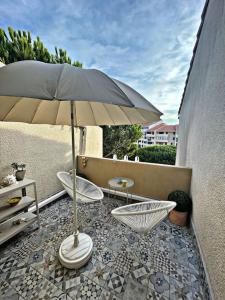 Balkón alebo terasa v ubytovaní Appartement Vintage 90 m2 DUPLEX classé